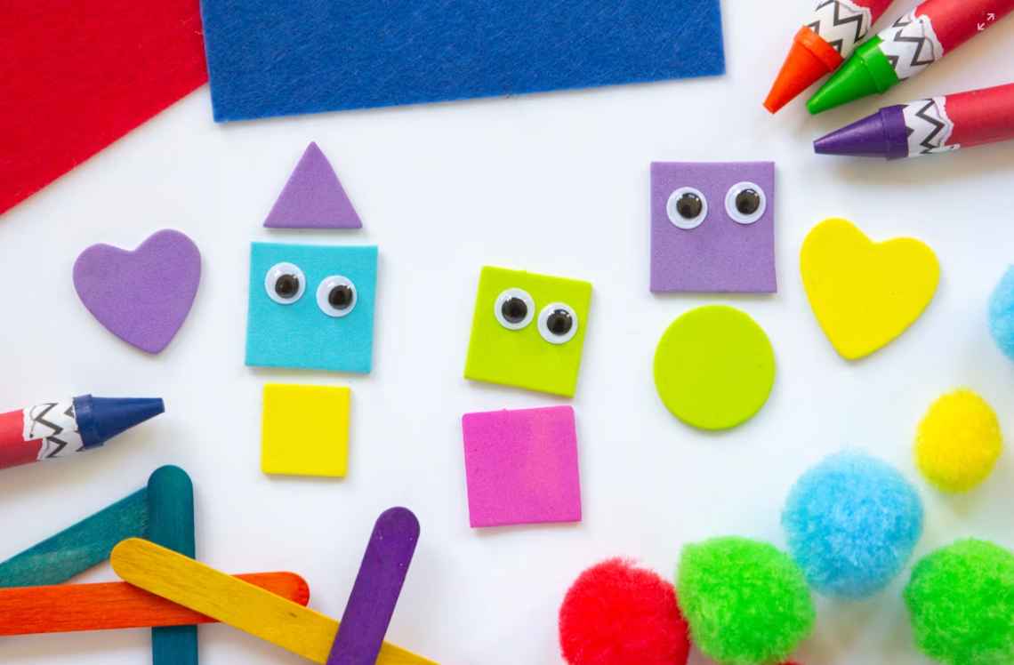 Teachers in a small group activity at Tots N Us