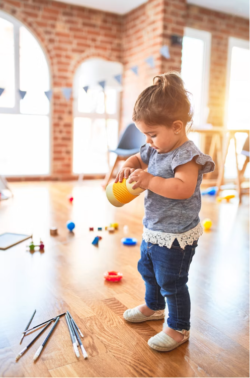 Children learning through love and care at Tots N Us