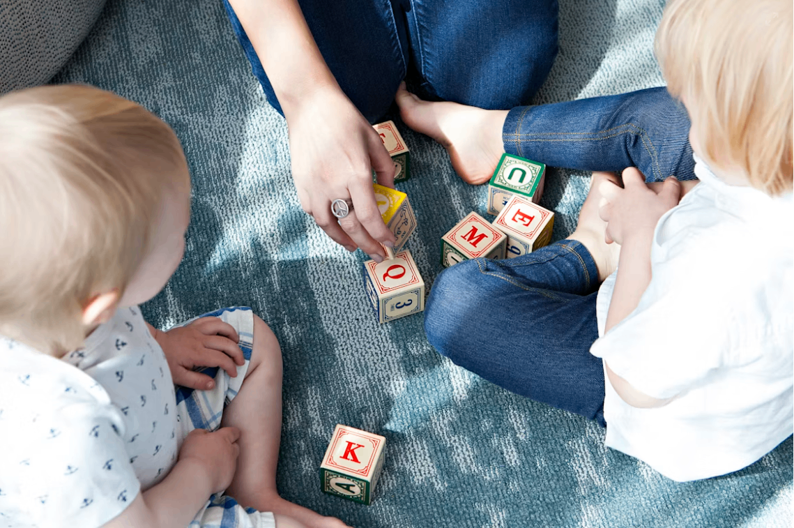 Children exploring and learning through play at Tots N Us Academy